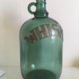 Green glass whiskey bottle