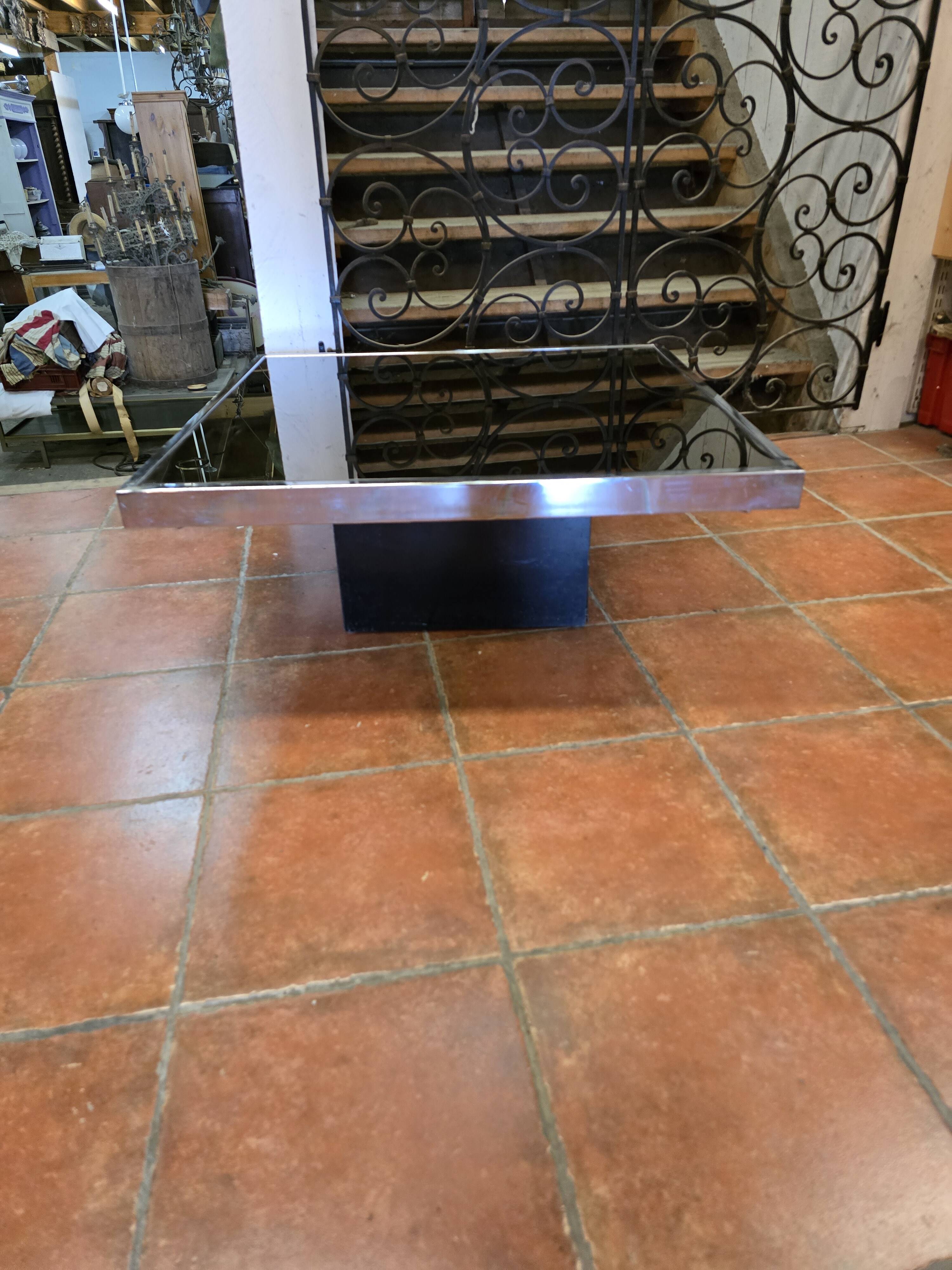 Chrome coffee table with smoked mirror top