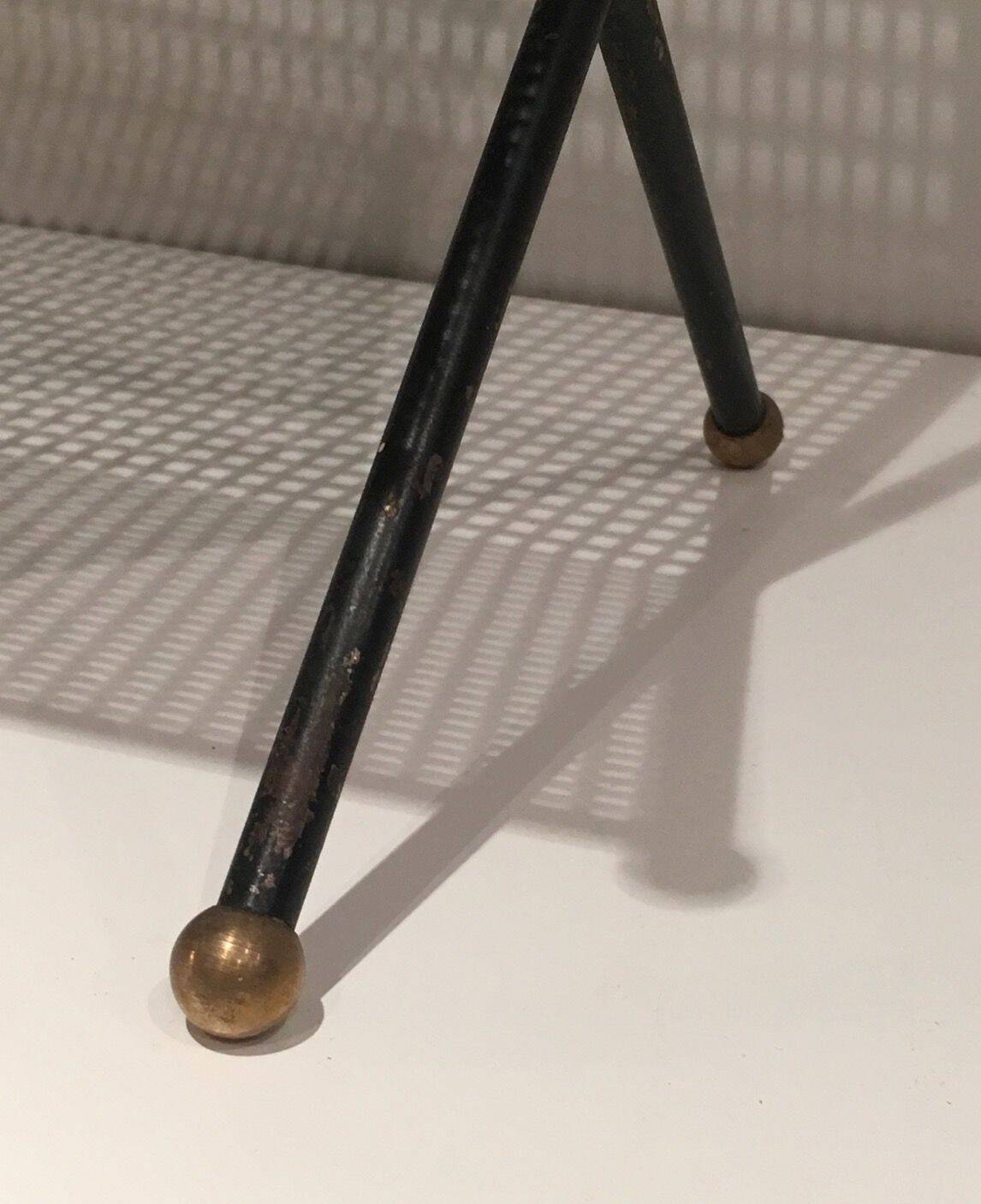 Black lacquered metal design magazine rack, perforated sheet and brass