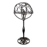 Wrought iron table lamp with a spherical shade