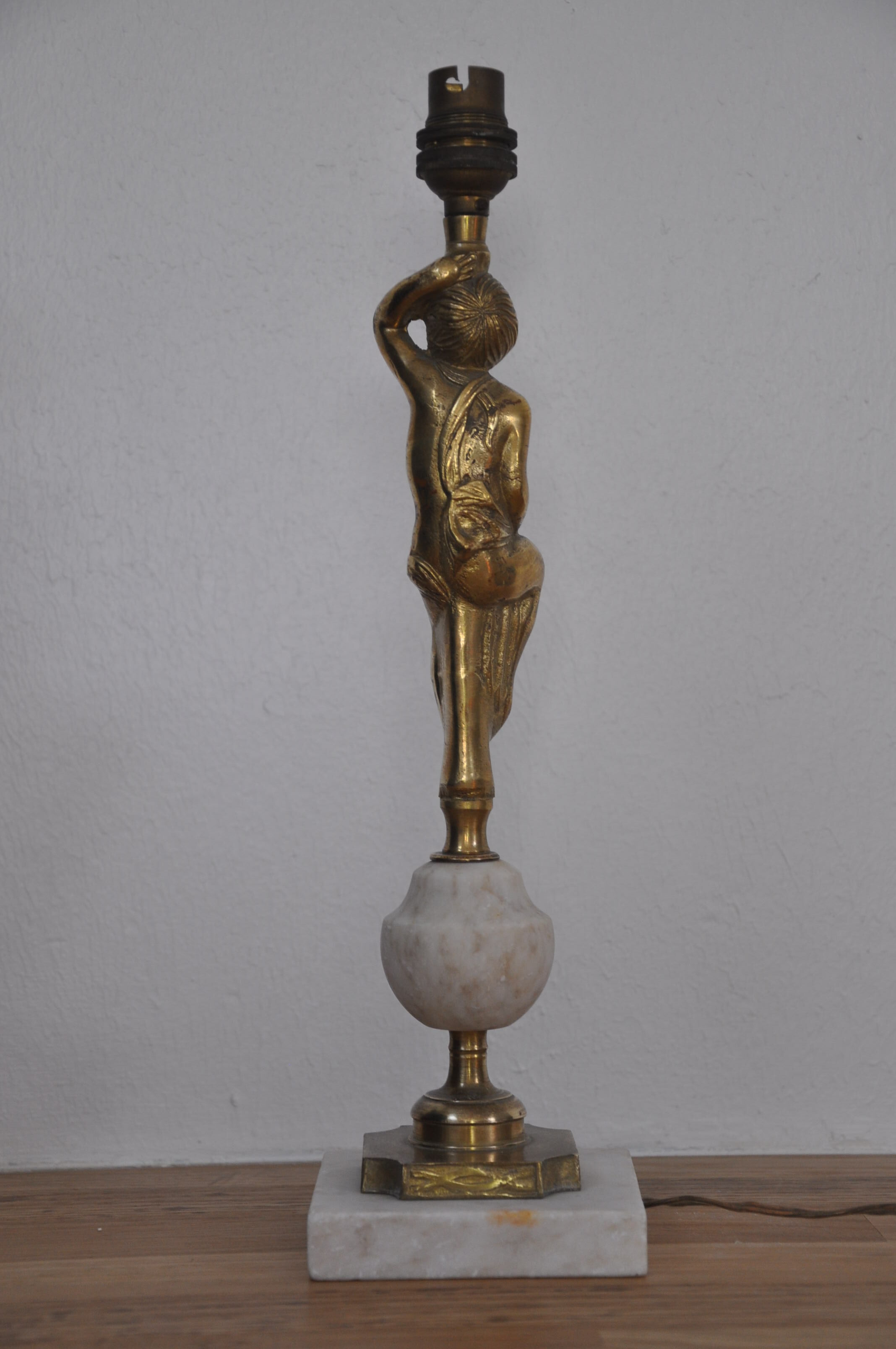Ancient alabaster lamp and bronze cherub decoration