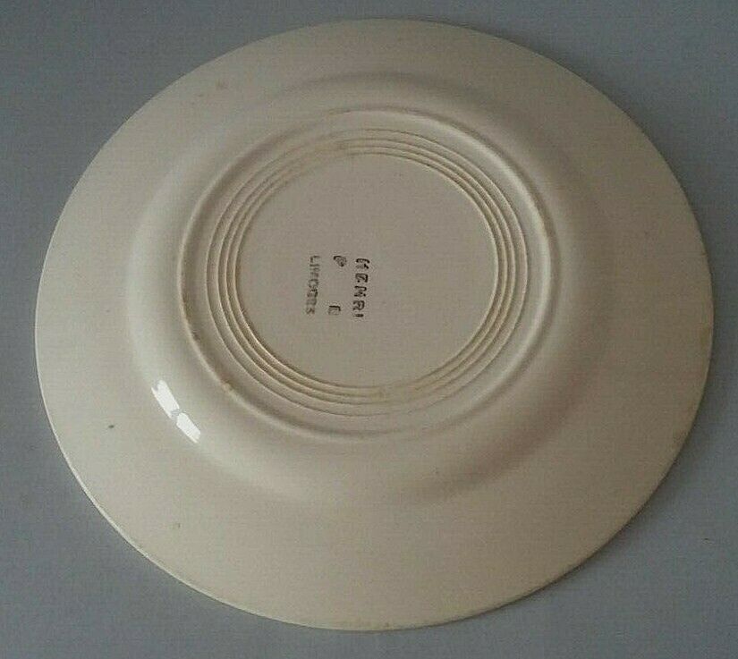 Flat plate in earthenware marked PB Limoges model Henri early XXth