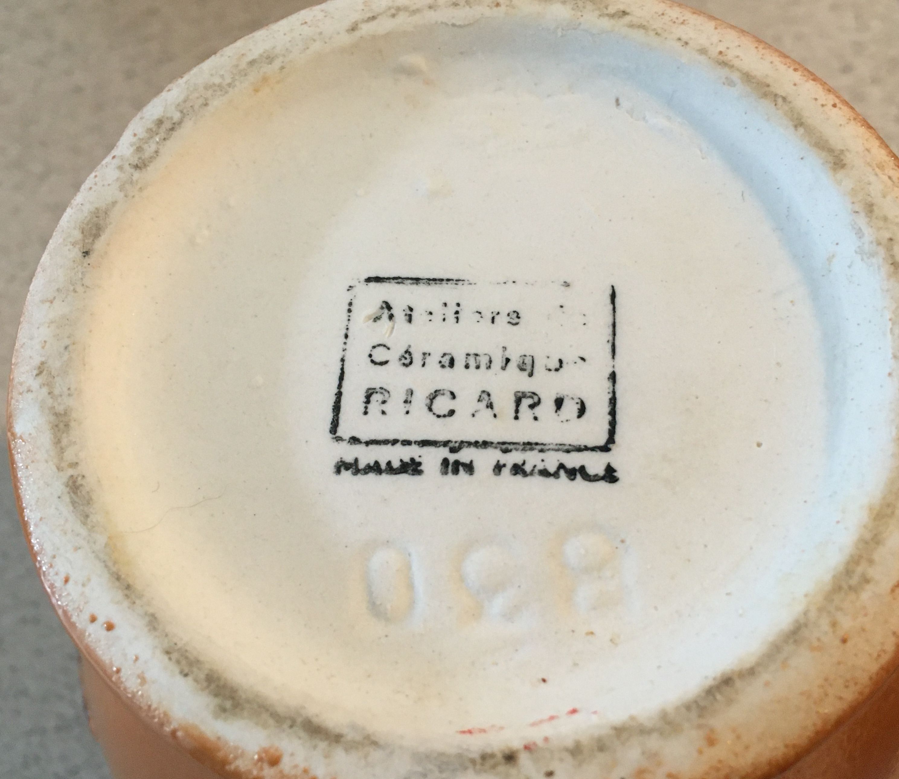 Ricard round ceramic carafe 1 liter a small chip