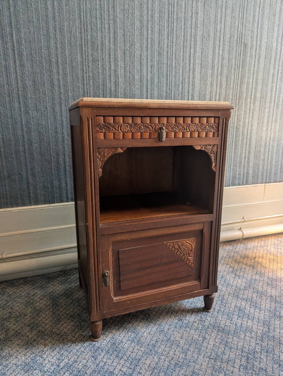 Bedside table with a marble top