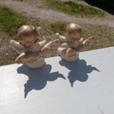 Pair of sitting angel statuettes