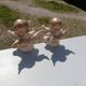 Pair of sitting angel statuettes