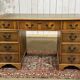 English flat desk with drawers from the 1970s in fir and leather top.