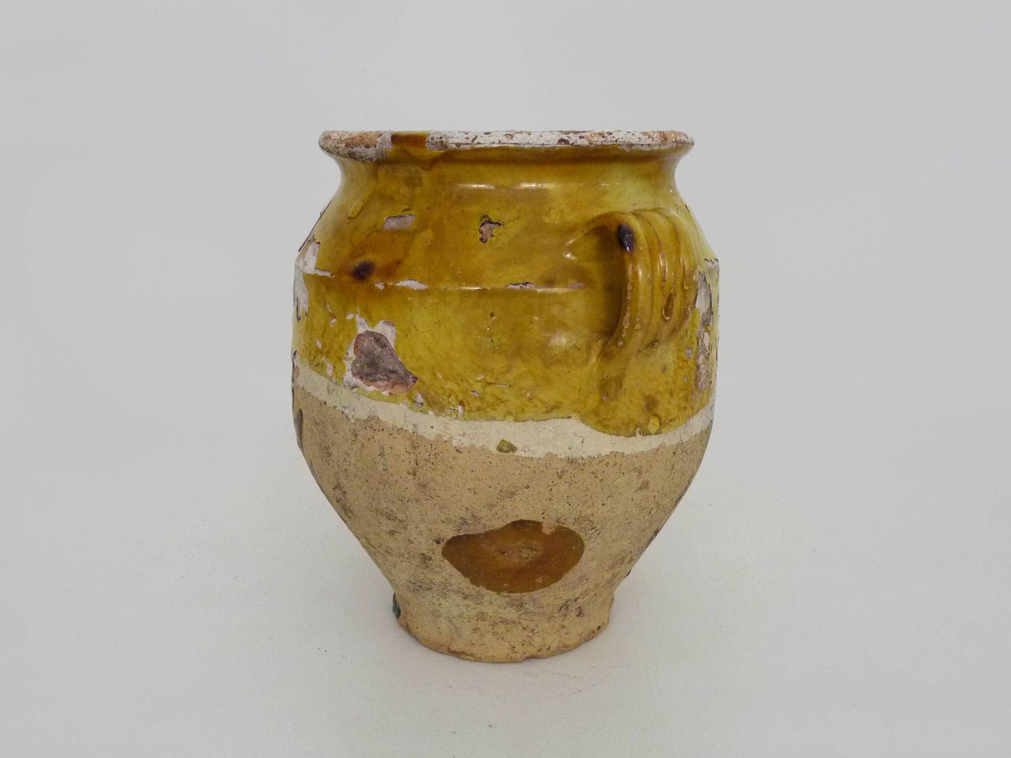 Magnificent glazed yellow confit pot, south-west of France. 19th century.
