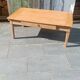 Solid wood coffee table with drawer and original key.