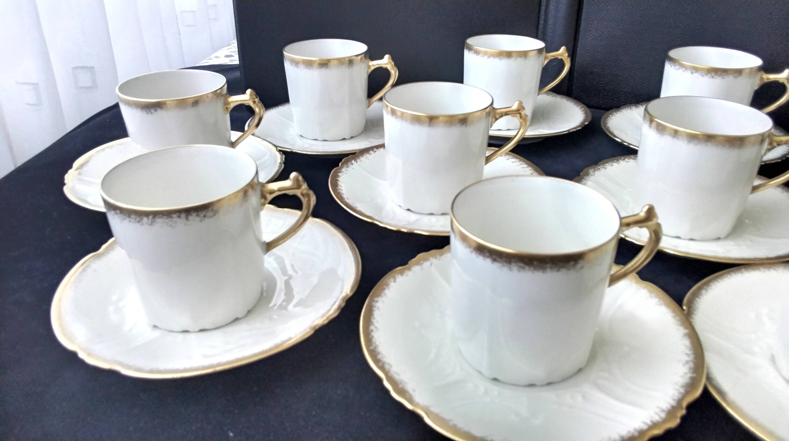 11 coffee cups in litre shape made of Limoges porcelain