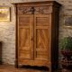 Empire wardrobe in solid walnut, France, mid-19th century.