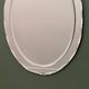 1970s Italian oval mirror by Crystal Arte with faceted glass frame