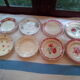 Assorted 8 ancient plates dominating red