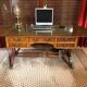 English office in blond mahogany and green leather