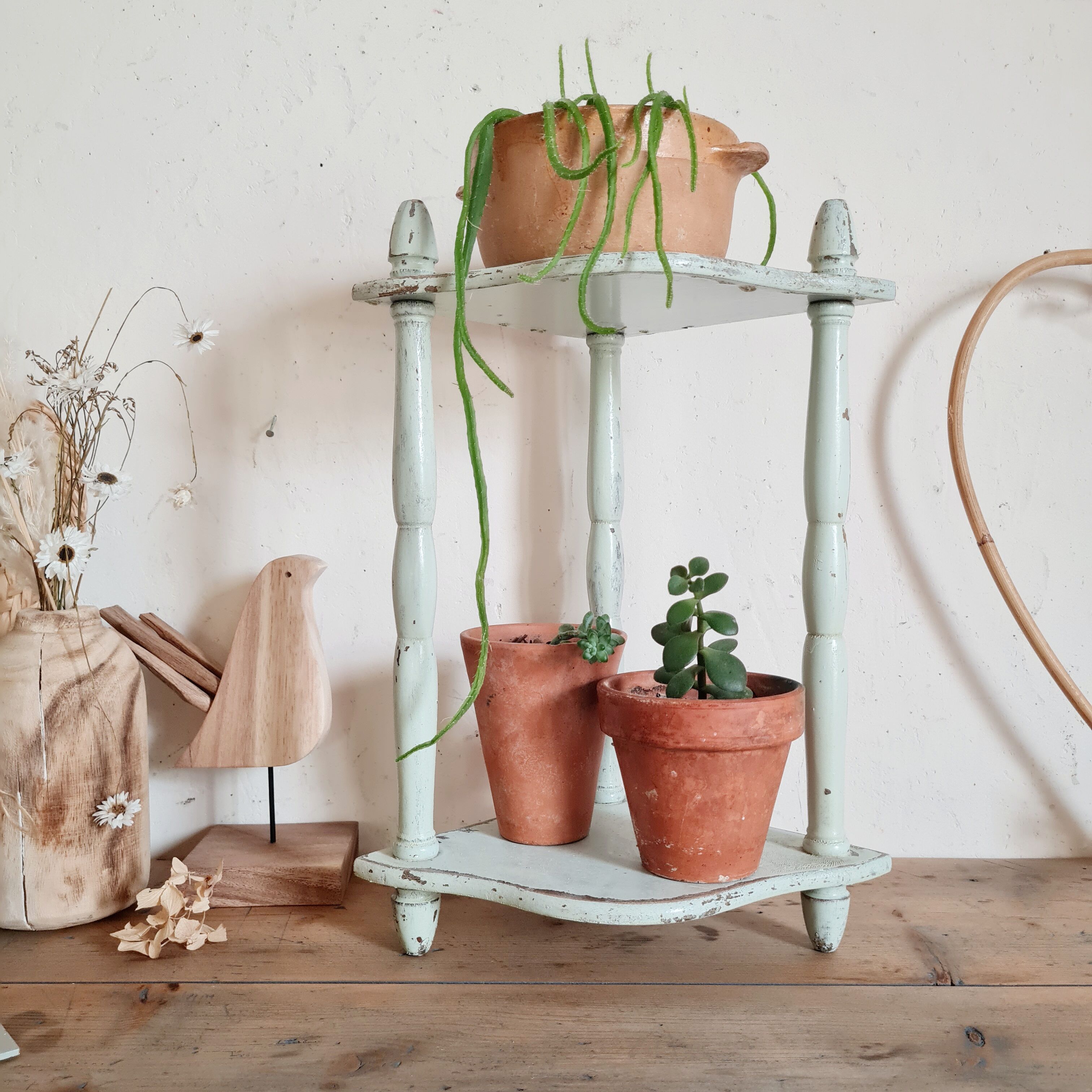 Old green patinated wooden shelf
