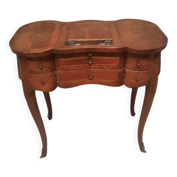 Louis XV style hairdresser forming a birthing table.