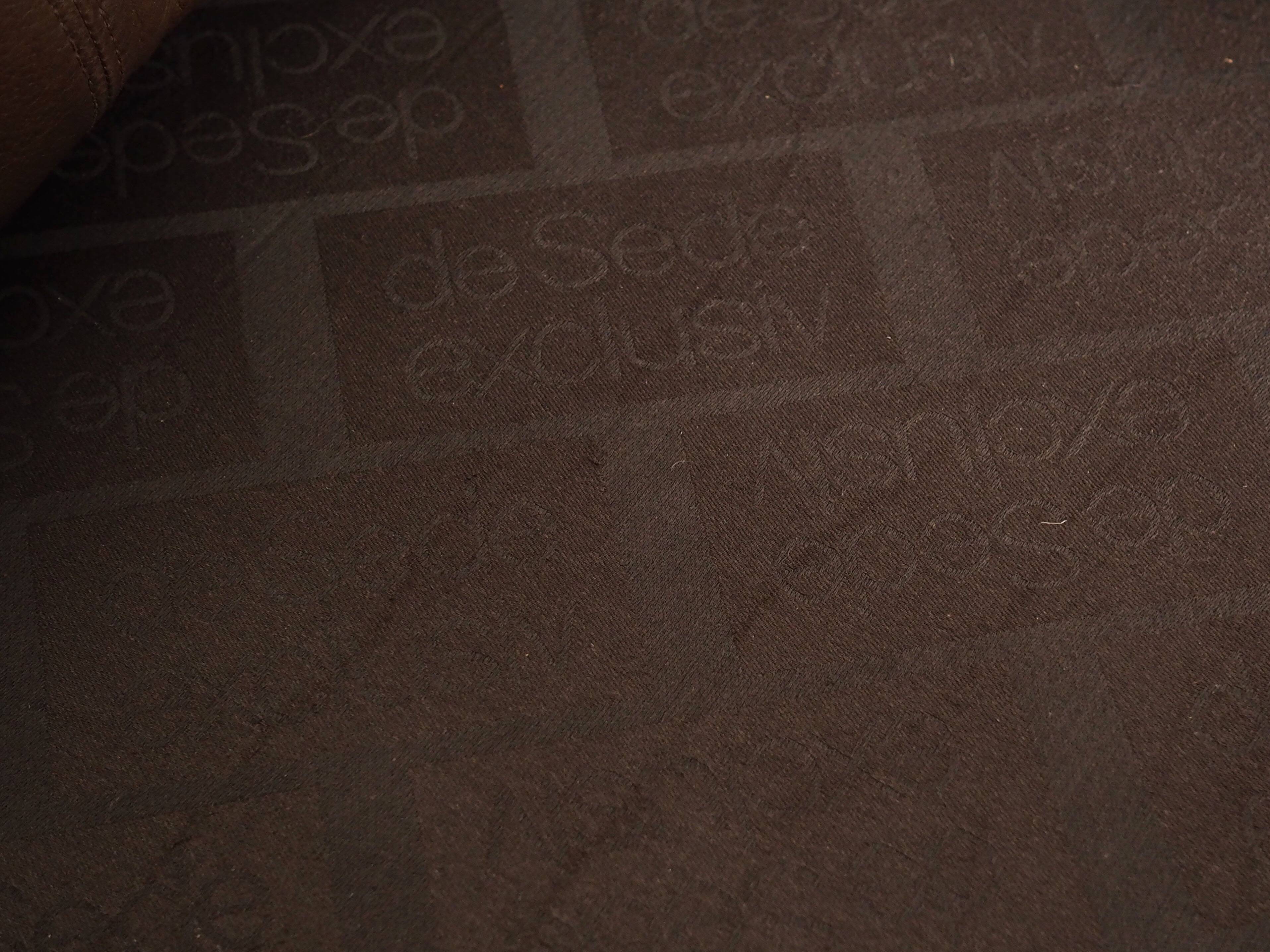 Fauteuil en cuir marron, design suisse, années 1970, fabrication : De Sede