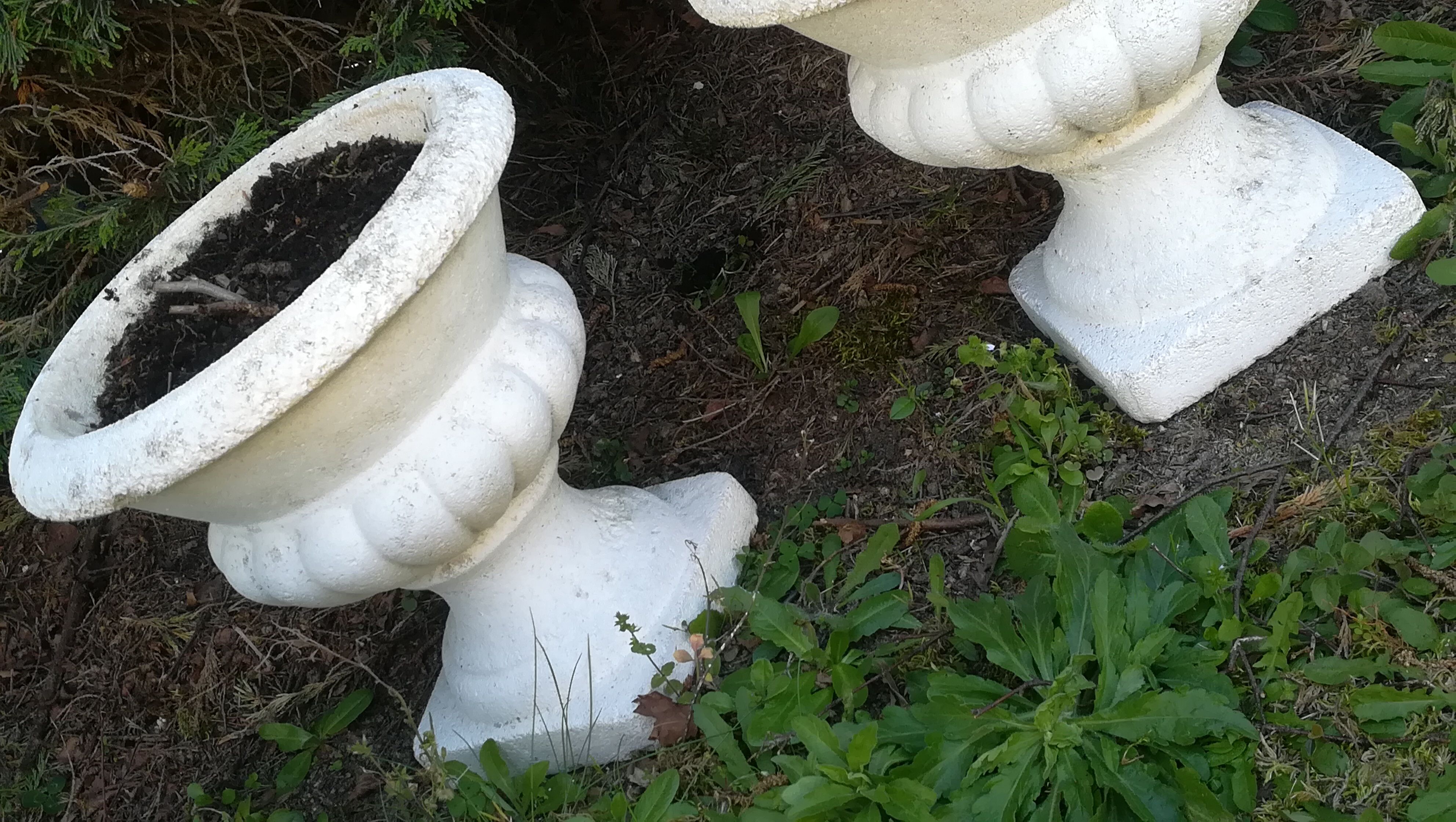 Pair of vases in reconstituted white stone