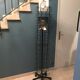 Display postcards and photos in black metal turnstile