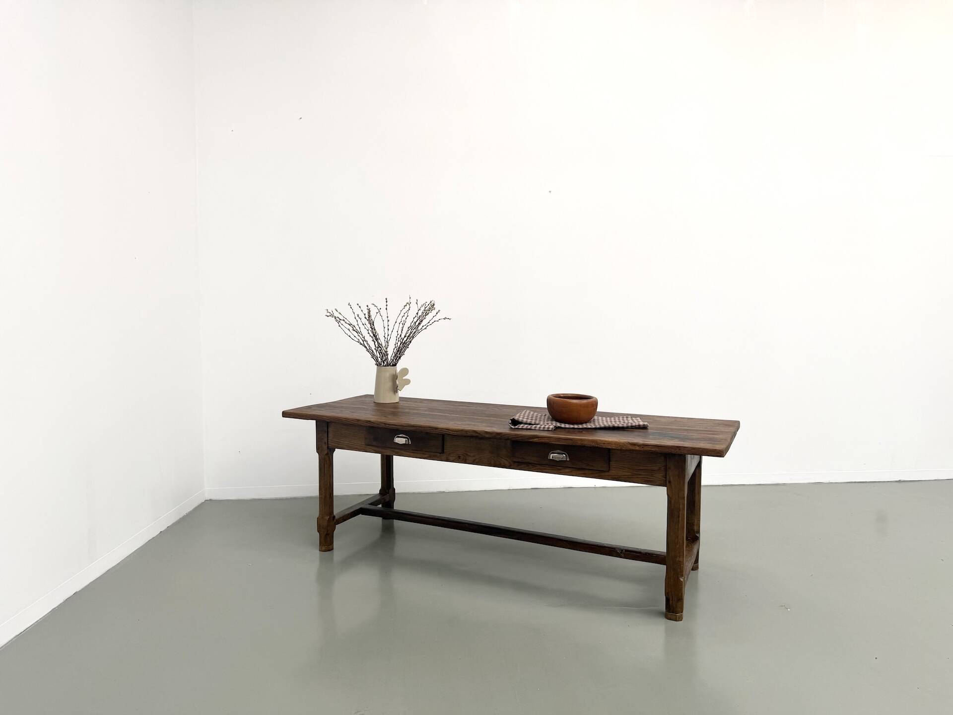 Authentic French farmhouse table from 1890 in solid oak with two drawers.
