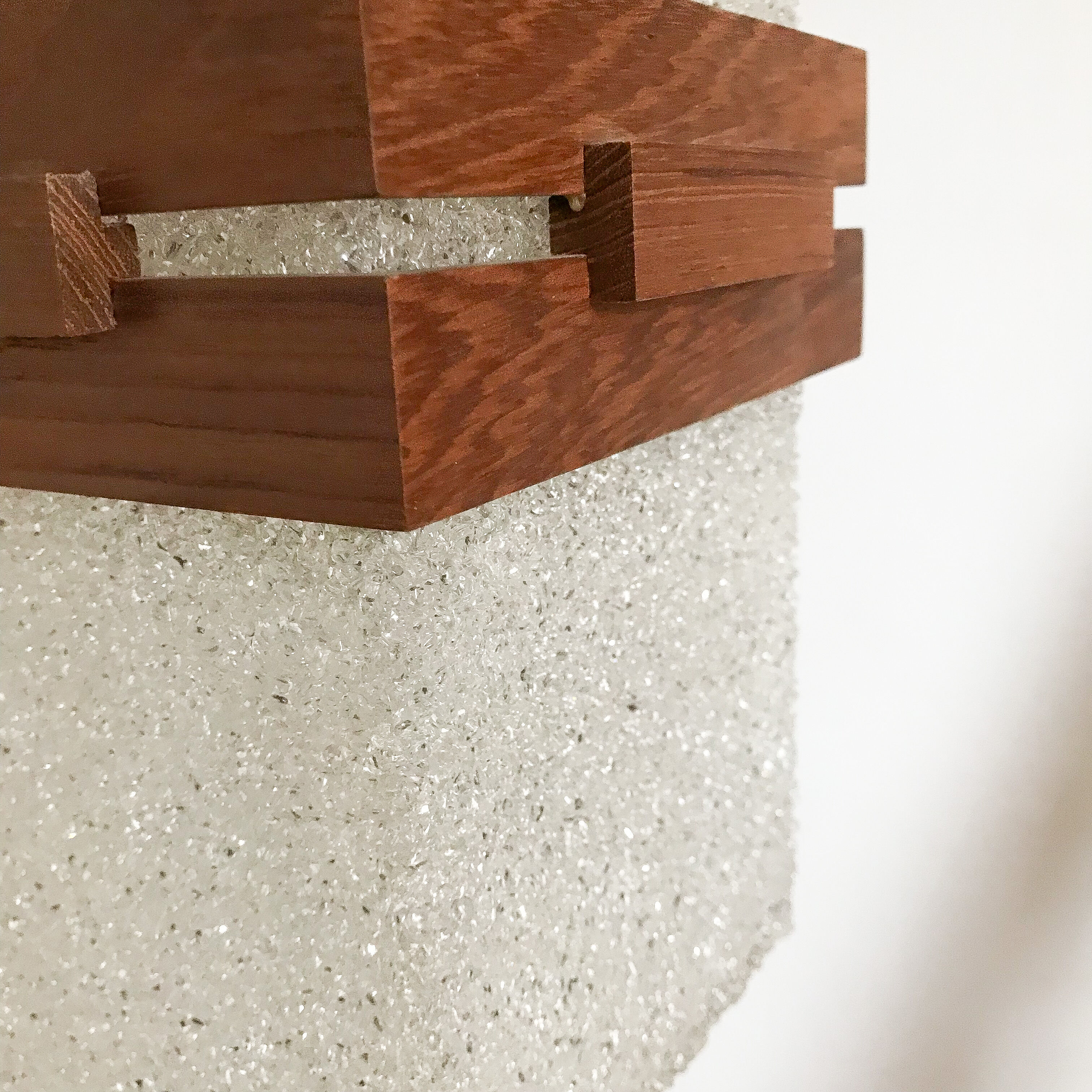 Suspension in perspex and teak