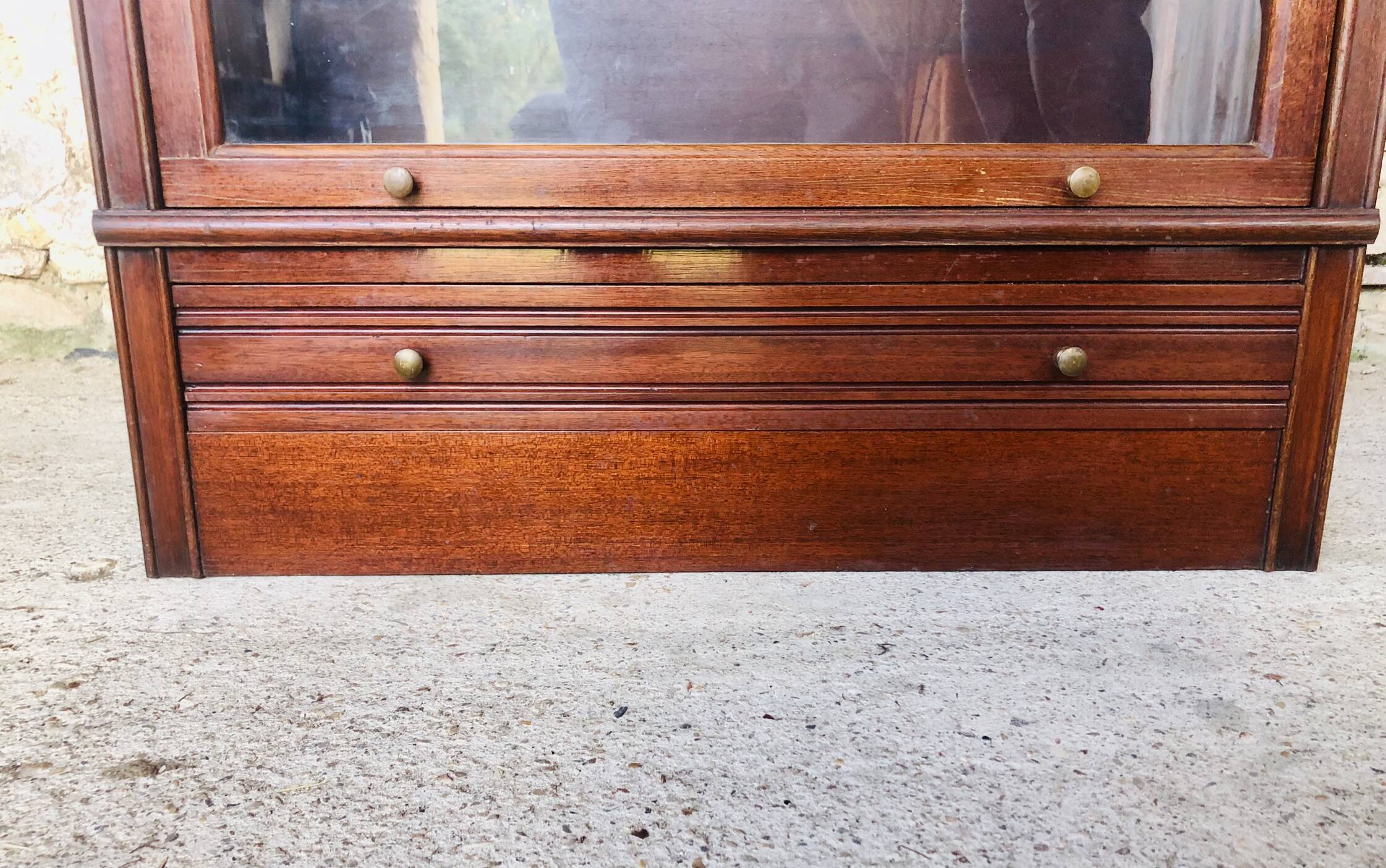 Vintage mahogany avocado bookcase with overhead glass doors circa 40's/50's
