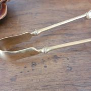 Golden metal sugar tongs