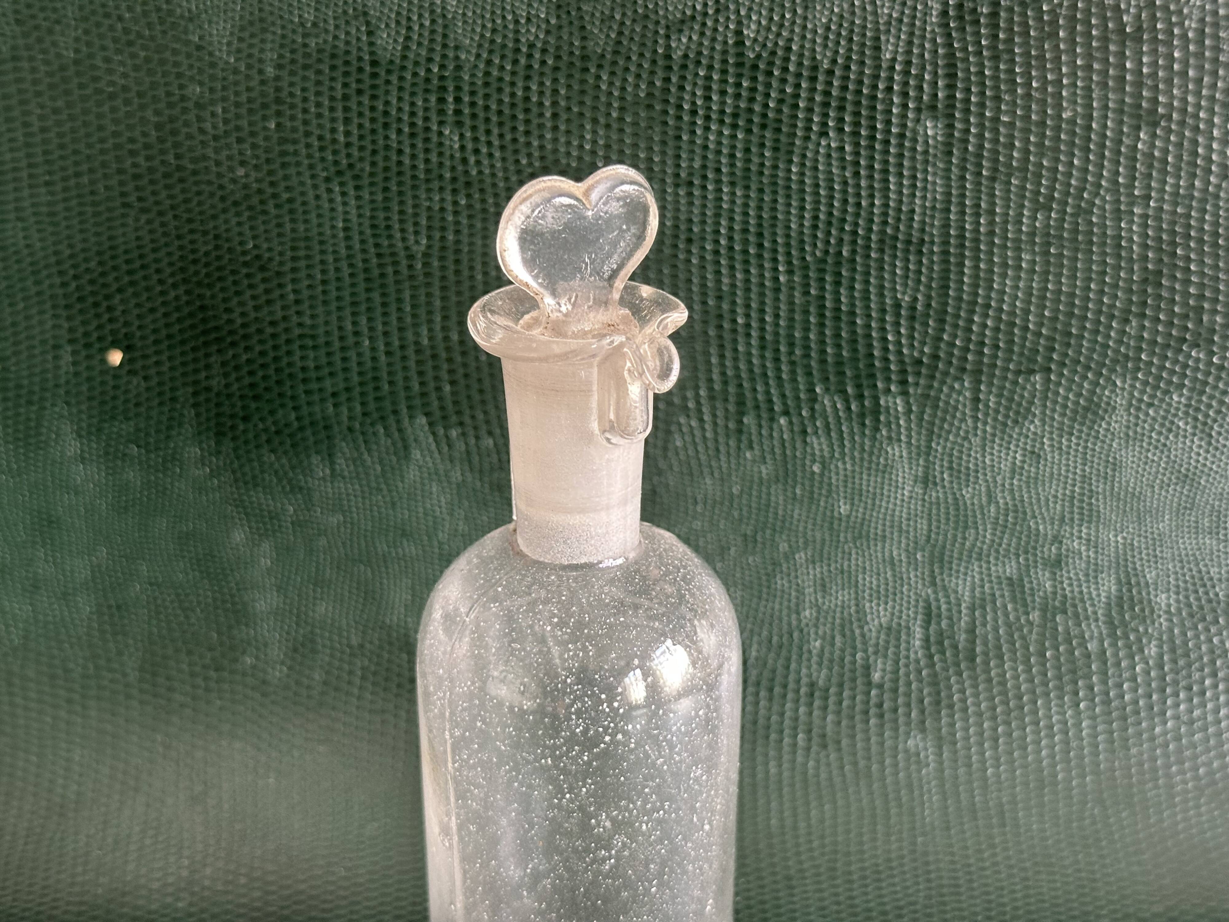 Flacon d’apothicaire ancien en verre, vers 1900