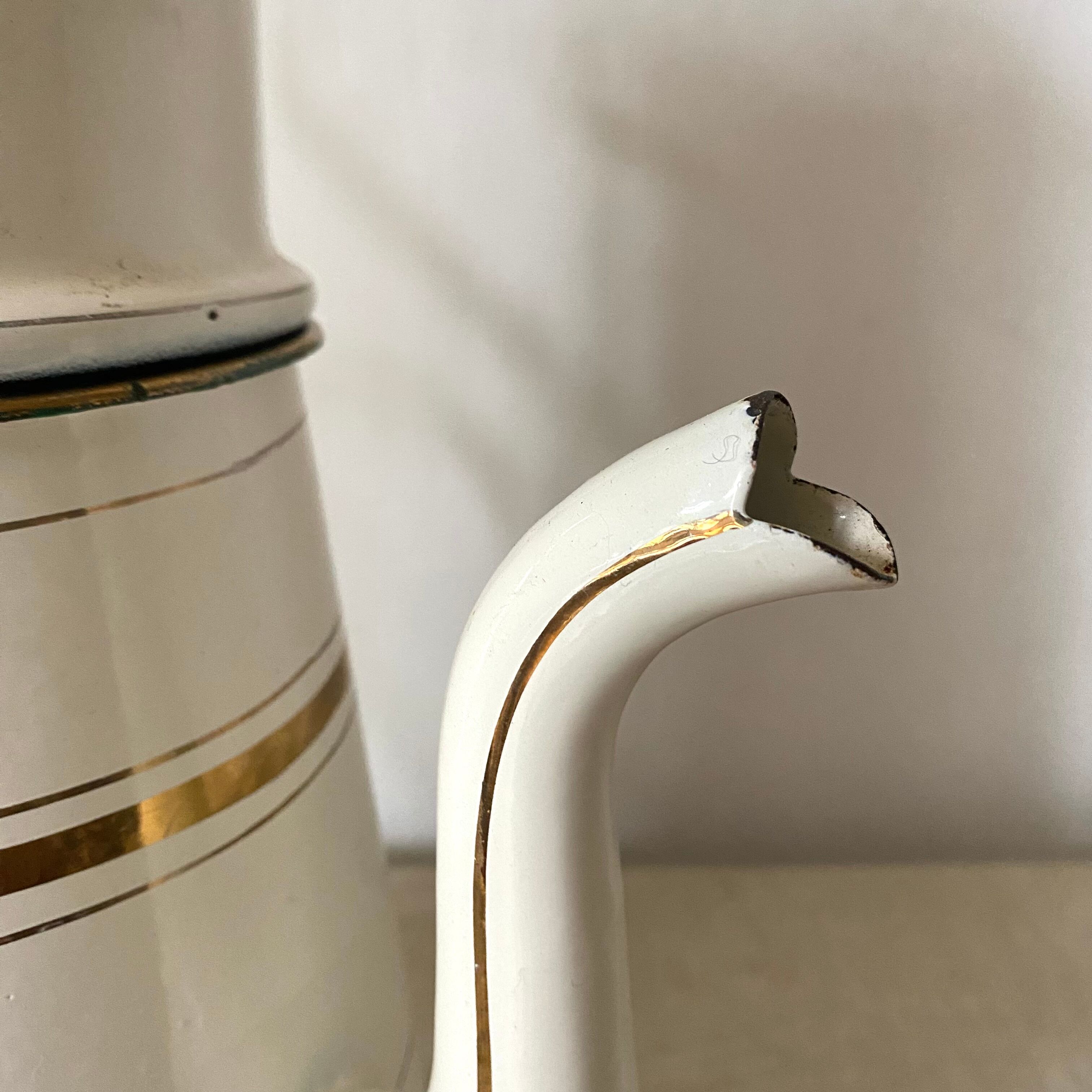 Antique coffee maker in enamelled sheet metal