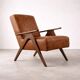 Fauteuil vintage en simili cuir marron