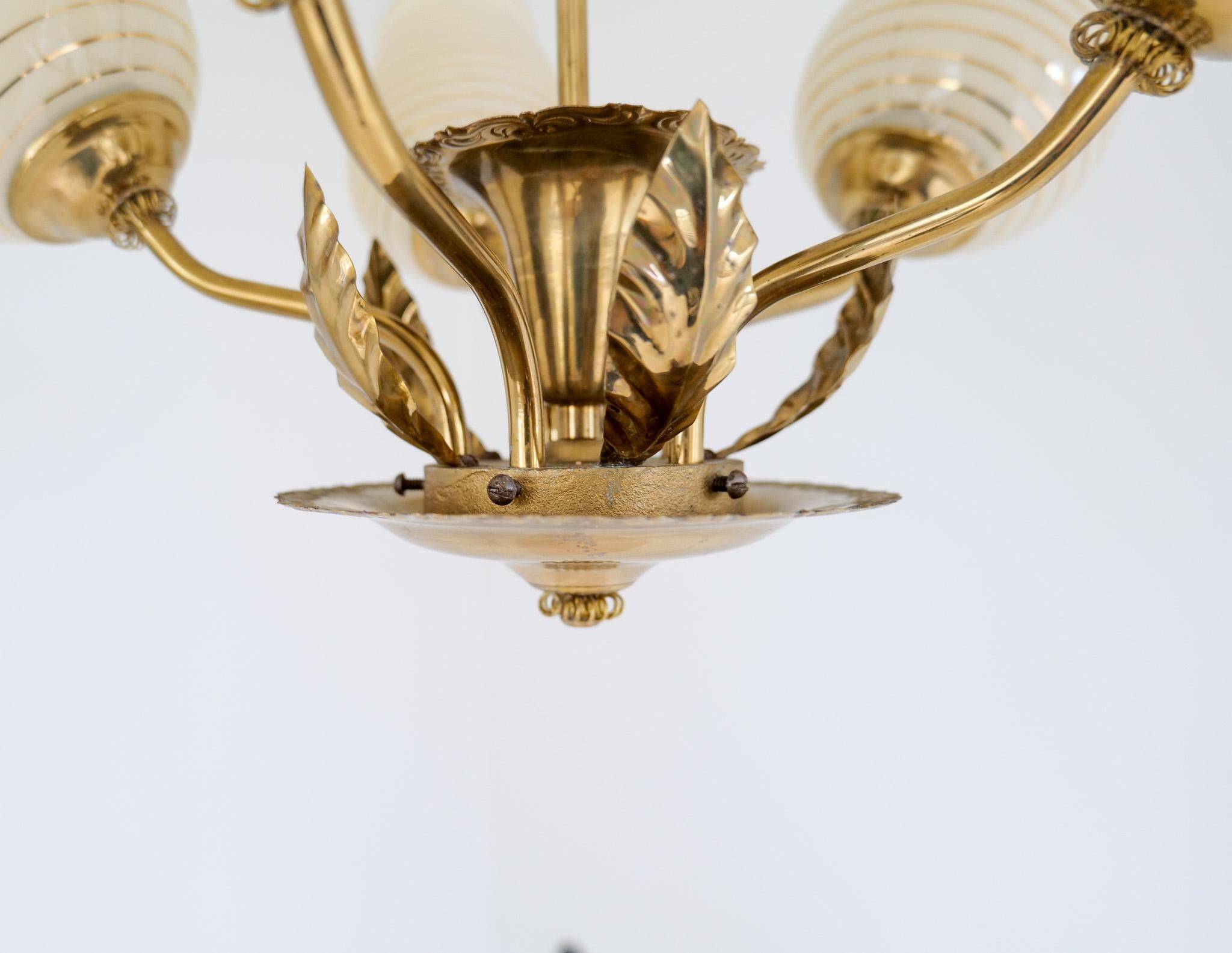 Mid-century brass and glass pendant light by Sario, Finland, 1950s.