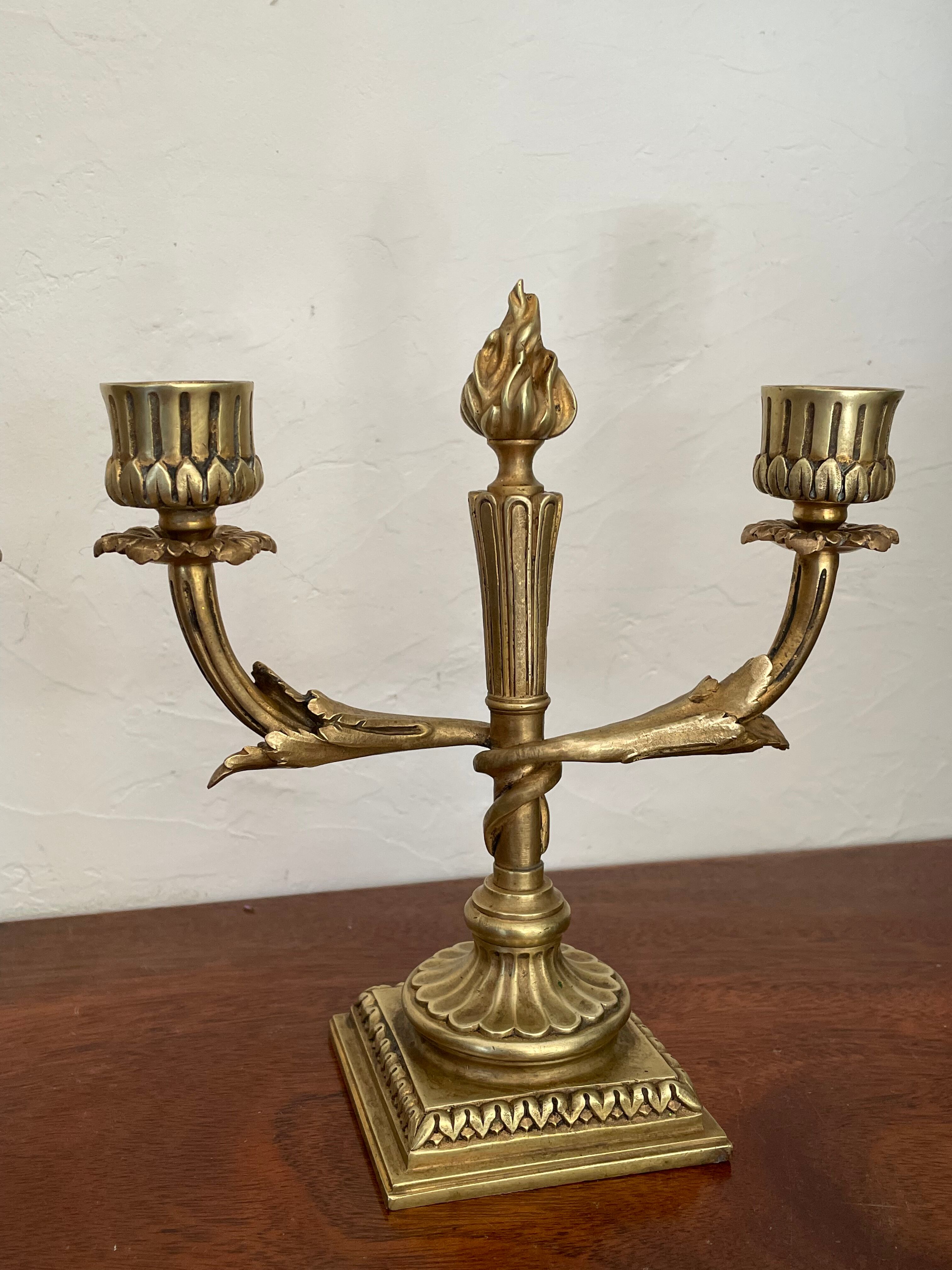 Pair of candle holders in gilded bronze nineteenth century