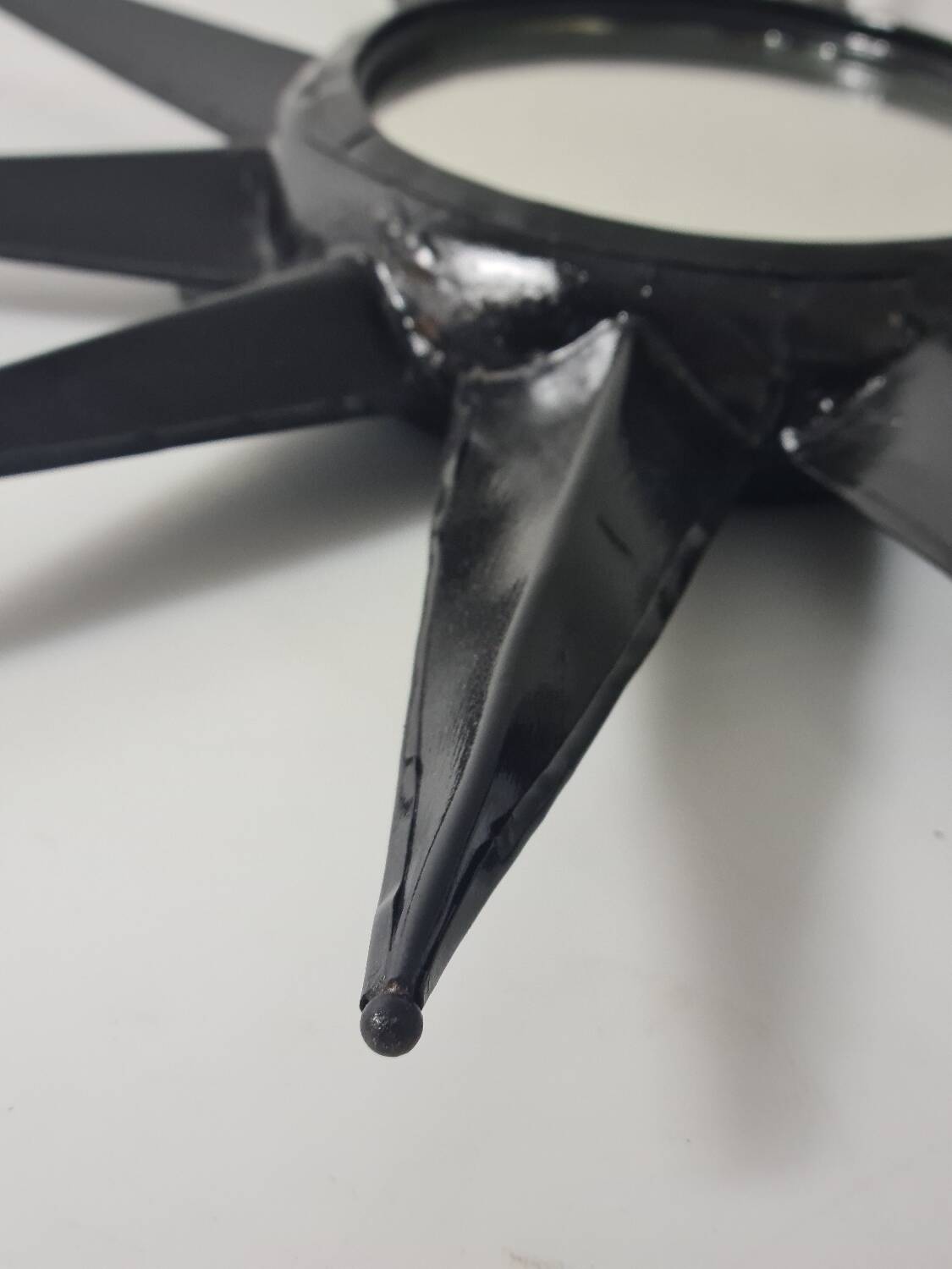 Antique metal star wall mirror black