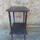 Patinated pedestal table