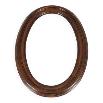 Large old oval wooden mirror