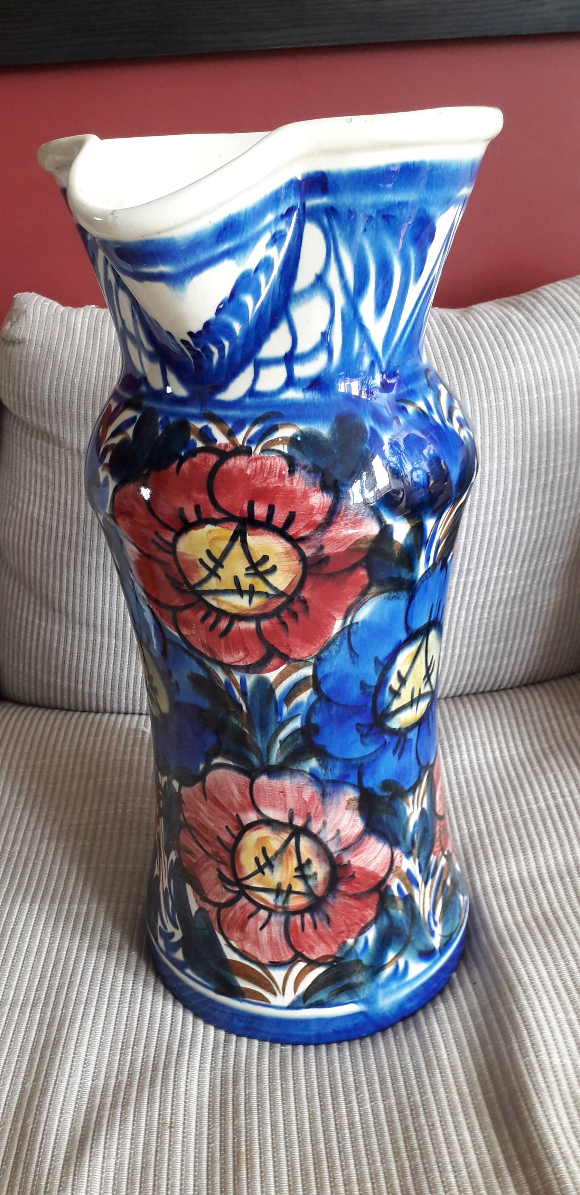 Large vintage vase with floral decoration