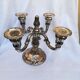 Pair of candlesticks in silver metal