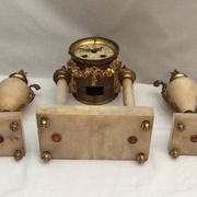 Clock fireplace trim and two vases in onyx and bronze style Louis XVI