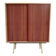 decorative midcentury cabinet with brass legs