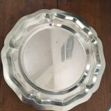 Two matching round dishes in stainless steel