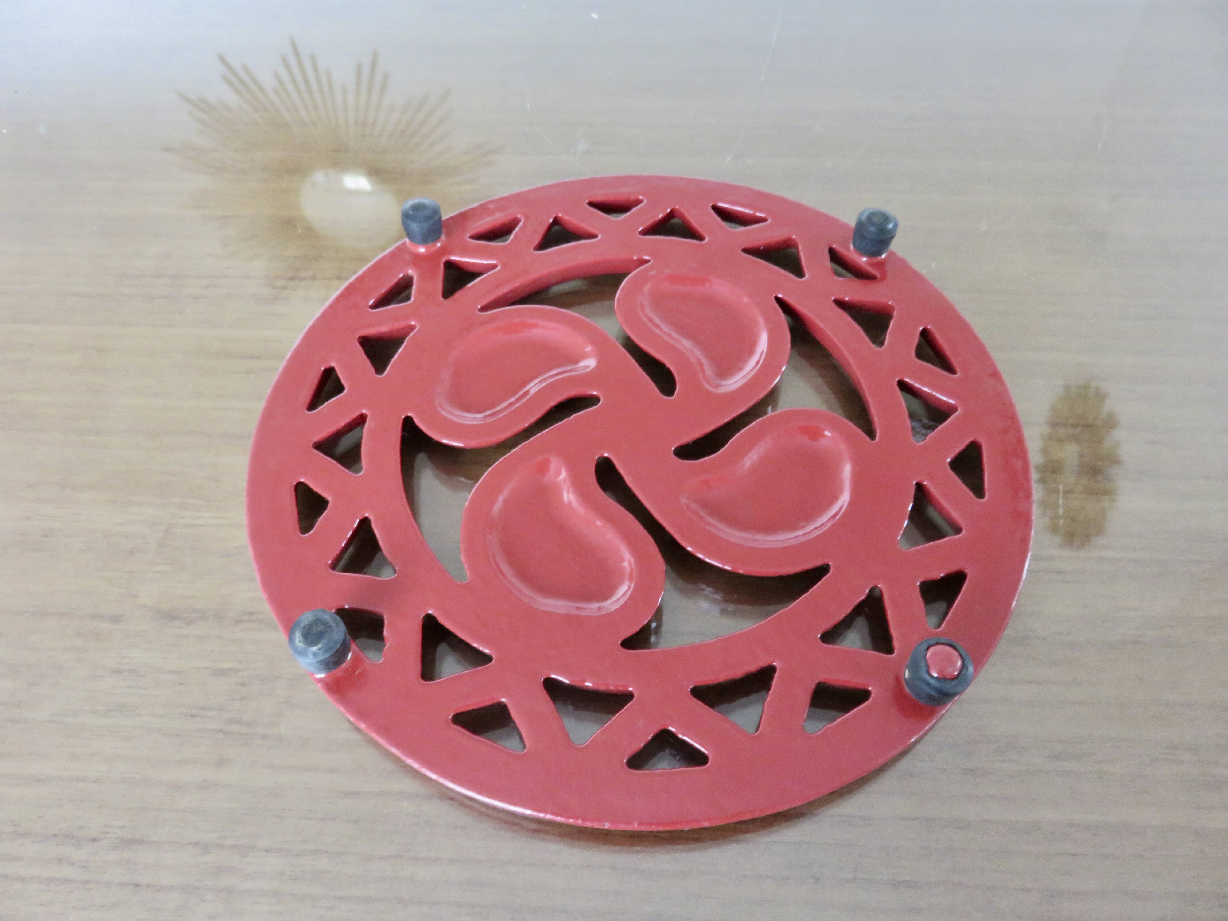Basque cross trivet in red cast iron 1970