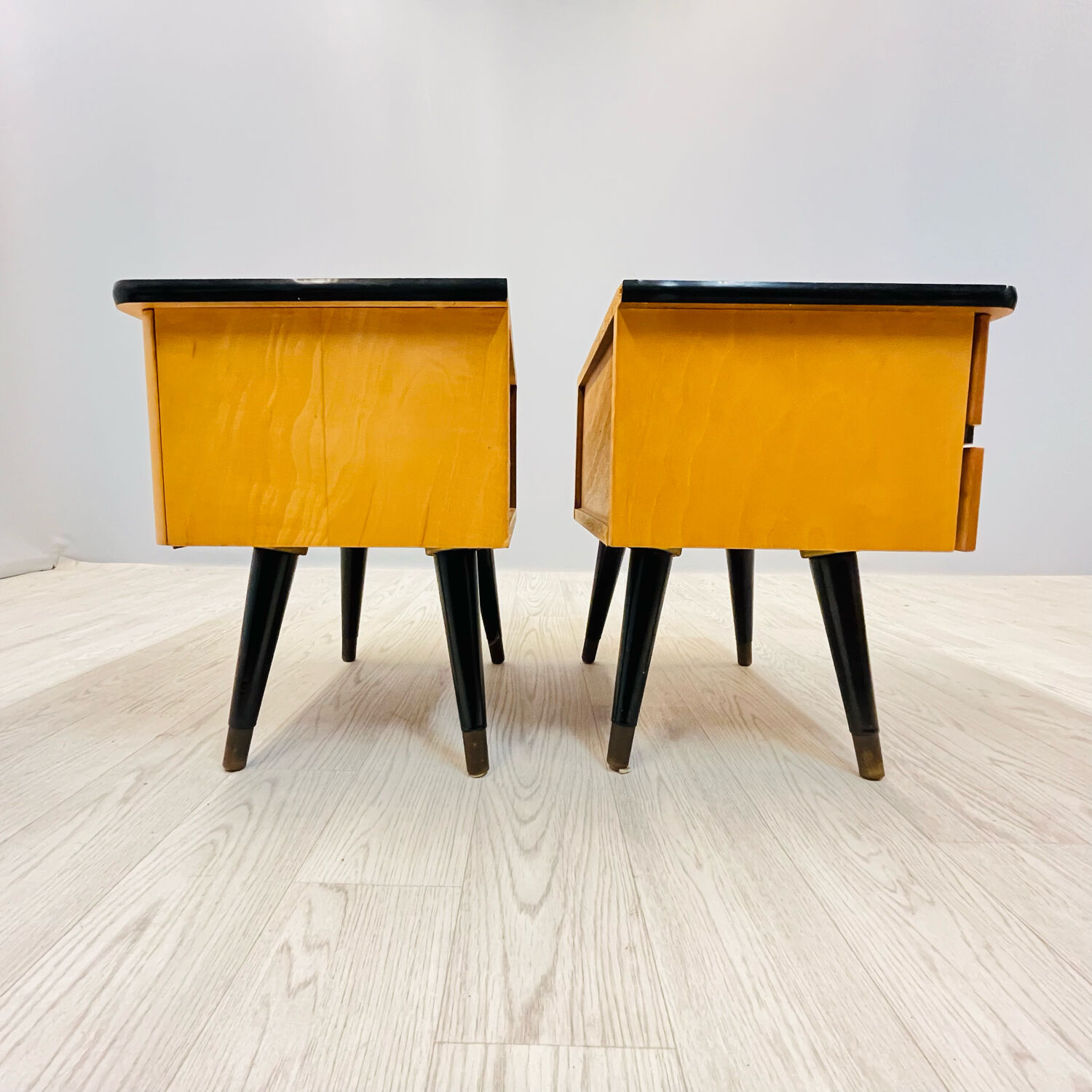 A pair of night cabinets