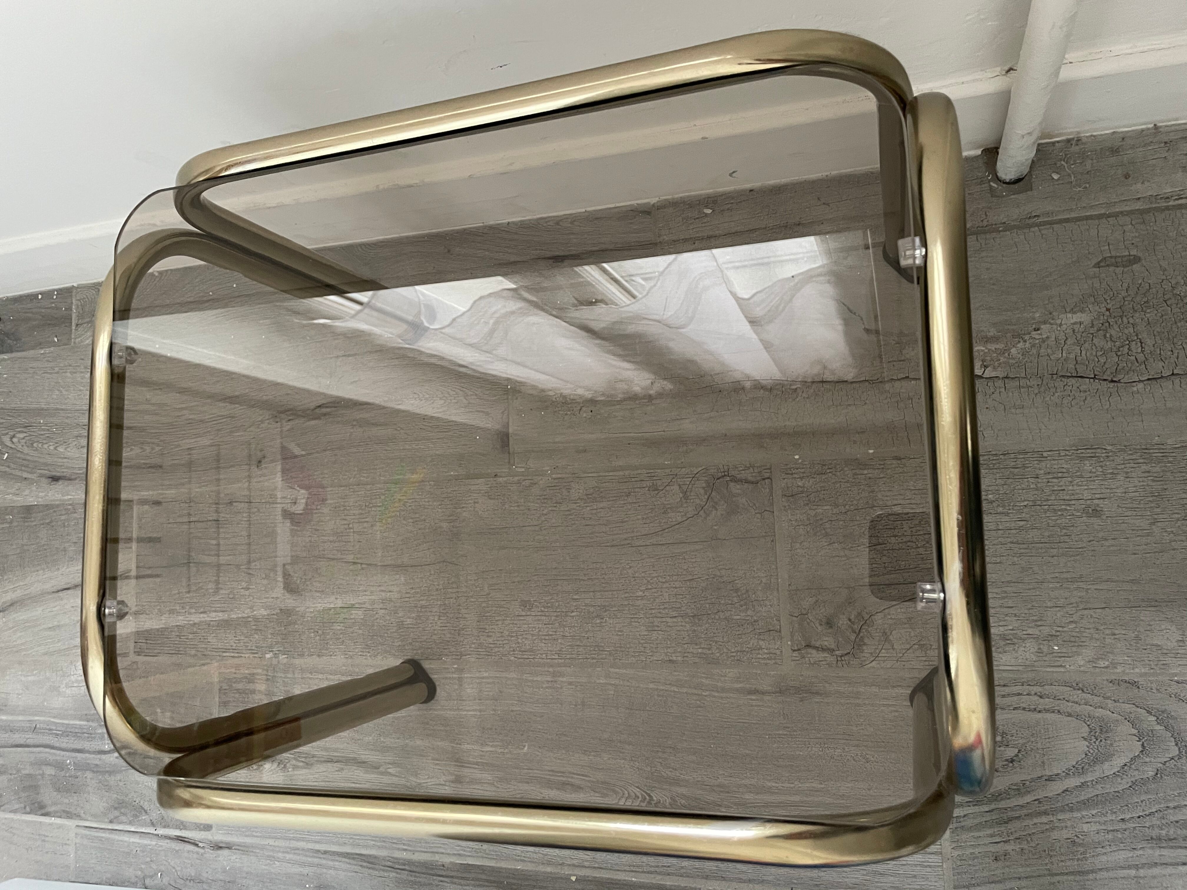 Pull-out tables in vintage smoked glass