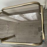 Pull-out tables in vintage smoked glass