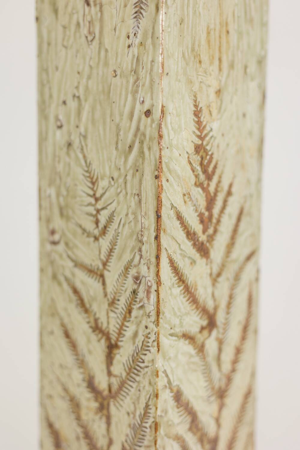 Brutalist stoneware vase with a plant motif. 1970s.