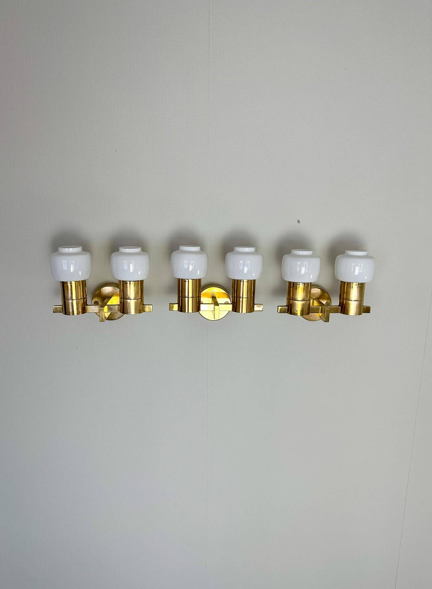 Brass and opaline glass wall lamps by Hans-Agne Jakobsson in mid-century style, Sweden, 1960s.