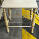 Patinated metal and wood double bed with integrated bedside tables.
