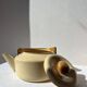 Vintage enamelled metal kettle in beige, Copco style.