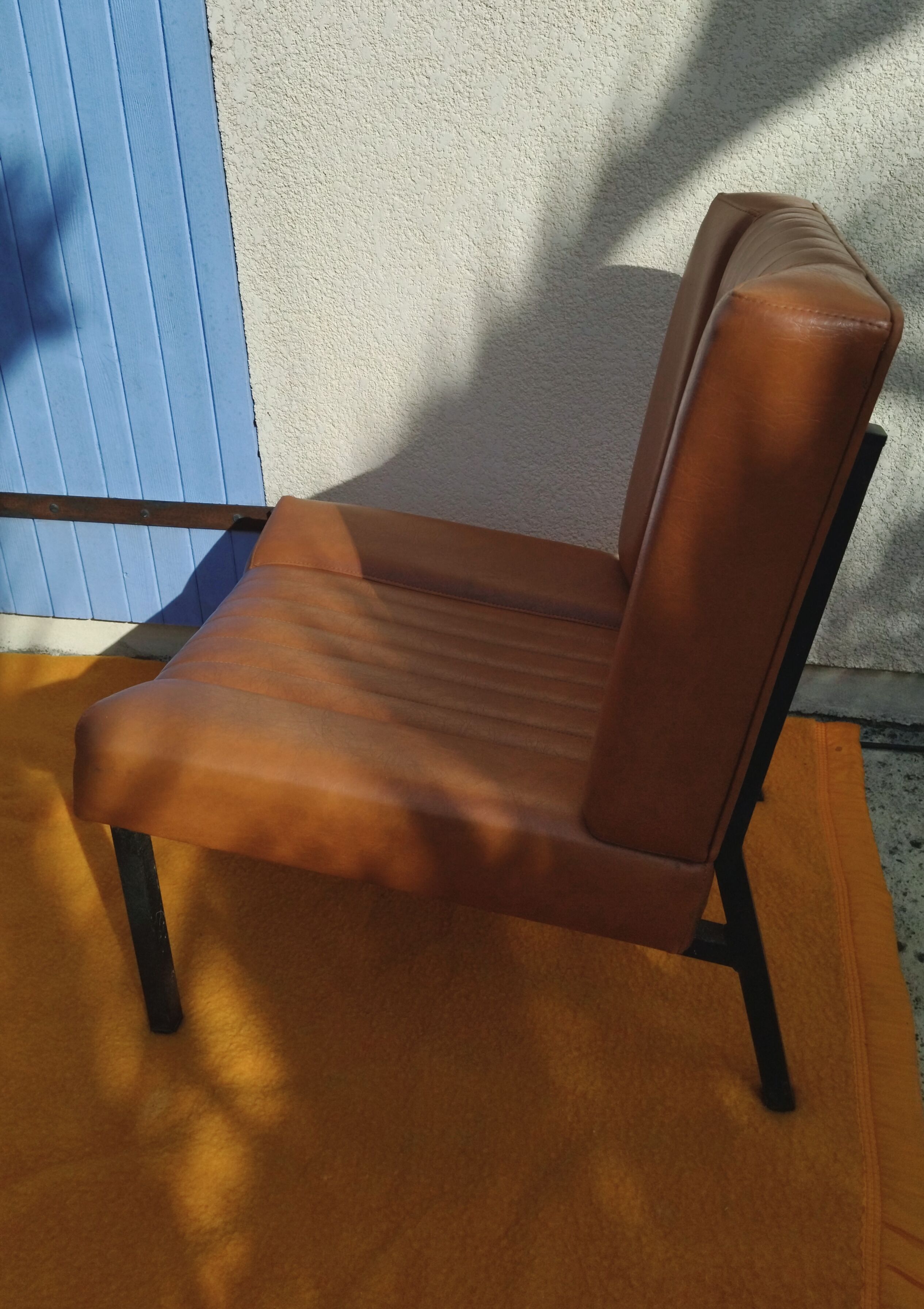 Pair of lounge armchairs, 70s leather