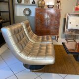 Paire de fauteuils en cuir